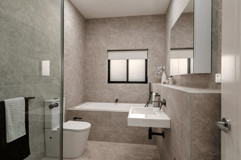 Modern Bathroom from Outdated Kitchen Conversion